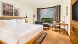 <b>Radisson Hotel Vrindavan Room</b>. Images powered by <a href="https://iceportal.shijigroup.com/" title="IcePortal" target="_blank">IcePortal</a>.
