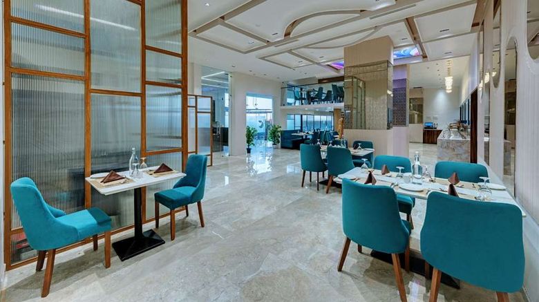 <b>Comfort Inn Sapphire, Chandkheda Restaurant</b>. Images powered by <a href="https://iceportal.shijigroup.com/" title="IcePortal" target="_blank">IcePortal</a>.