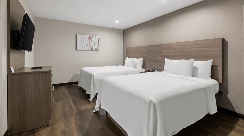 <b>Quality Suites Wildwood-The Villages Room</b>. Images powered by <a href="https://iceportal.shijigroup.com/" title="IcePortal" target="_blank">IcePortal</a>.