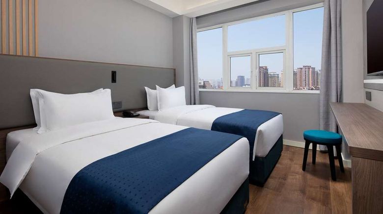 <b>Ramada Encore Qingdao Shinan Room</b>. Images powered by <a href="https://iceportal.shijigroup.com/" title="IcePortal" target="_blank">IcePortal</a>.
