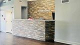 <b>AmericInn by Wyndham Rawlins Lobby</b>. Images powered by <a href="https://iceportal.shijigroup.com/" title="IcePortal" target="_blank">IcePortal</a>.