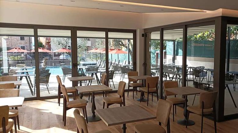 <b>Hotel Al Caminetto WorldHotels Crafted Restaurant</b>. Images powered by <a href="https://iceportal.shijigroup.com/" title="IcePortal" target="_blank">IcePortal</a>.