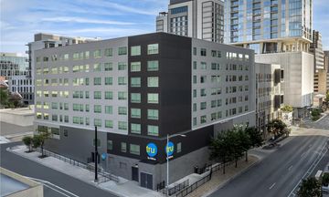 Tru Austin Univ Cap Dist