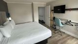 <b>The Midtowner Hotel, SureStay Collection Room</b>. Images powered by <a href="https://iceportal.shijigroup.com/" title="IcePortal" target="_blank">IcePortal</a>.