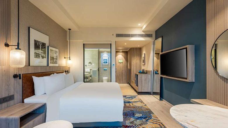 <b>Radisson Resort and Spa Khopoli Room</b>. Images powered by <a href="https://iceportal.shijigroup.com/" title="IcePortal" target="_blank">IcePortal</a>.