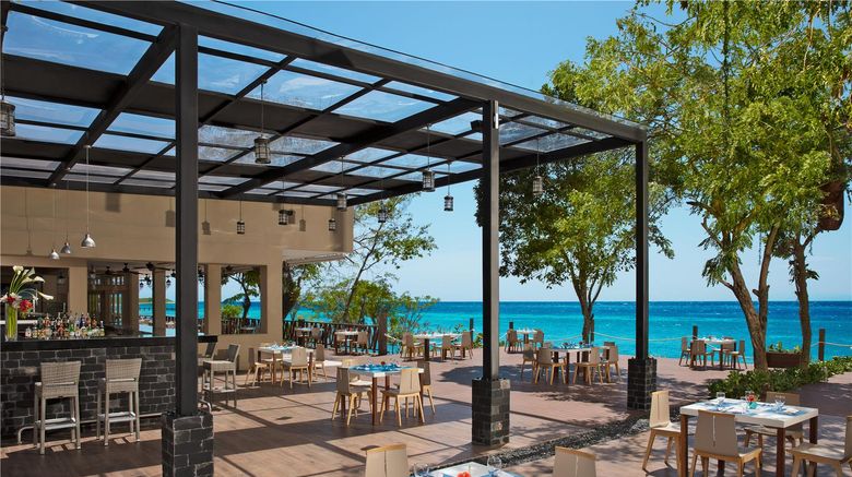 <b>Dreams Cozumel Cape Resort & Spa Restaurant</b>. Images powered by <a href="https://iceportal.shijigroup.com/" title="IcePortal" target="_blank">IcePortal</a>.