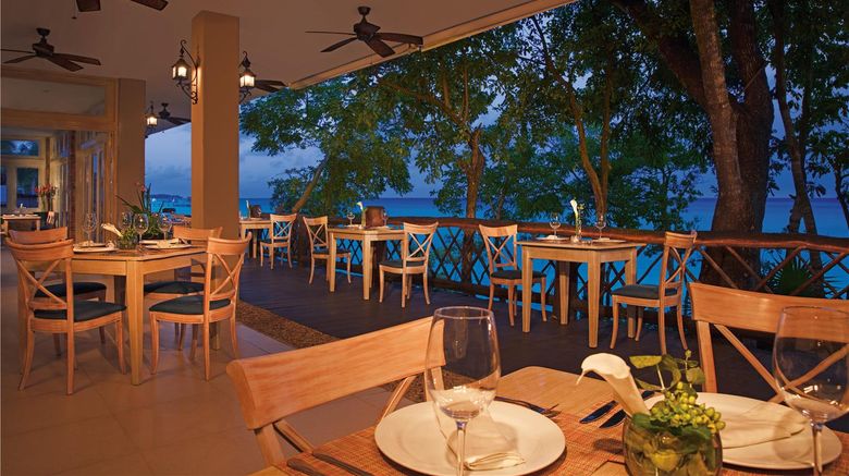 <b>Dreams Cozumel Cape Resort & Spa Restaurant</b>. Images powered by <a href="https://iceportal.shijigroup.com/" title="IcePortal" target="_blank">IcePortal</a>.