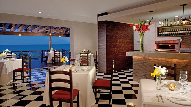 <b>Dreams Cozumel Cape Resort & Spa Restaurant</b>. Images powered by <a href="https://iceportal.shijigroup.com/" title="IcePortal" target="_blank">IcePortal</a>.