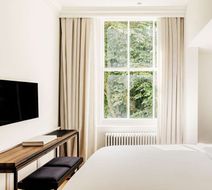 The Caesar Hotel Room