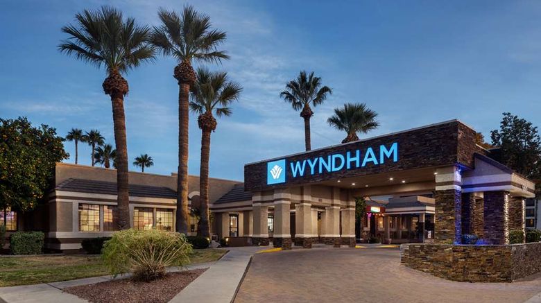 Wyndham Tucson Airport  and  Conf Ctr Exterior. Images powered by <a href="https://iceportal.shijigroup.com" target="_blank" rel="noopener">Ice Portal</a>.