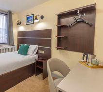 The Royal Hotel Room