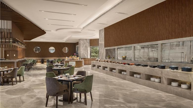 <b>Radisson Hotel Delhi MG Road Restaurant</b>. Images powered by <a href="https://iceportal.shijigroup.com/" title="IcePortal" target="_blank">IcePortal</a>.