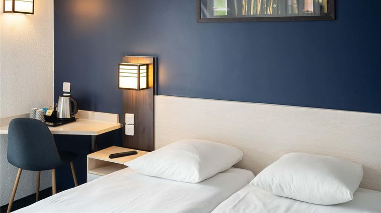 Hotel L'Eaubonne Room
