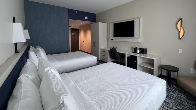 Sugar Creek Inn & Suites Room