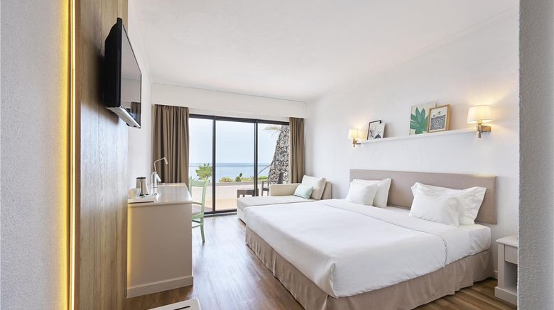 <b>Caloura Hotel Resort Room</b>. Images powered by <a href="https://iceportal.shijigroup.com/" title="IcePortal" target="_blank">IcePortal</a>.