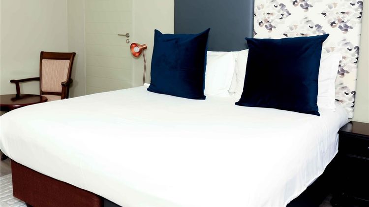 Q's Evander Hotel & Apartments Room