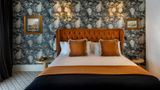 The First One Hotel Room