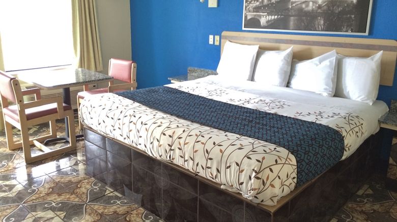 <b>American Choice Inn Room</b>. Images powered by <a href="https://iceportal.shijigroup.com/" title="IcePortal" target="_blank">IcePortal</a>.
