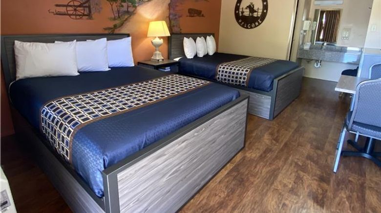 <b>Americas Best Value Inn-The Legends Inn Room</b>. Images powered by <a href="https://iceportal.shijigroup.com/" title="IcePortal" target="_blank">IcePortal</a>.