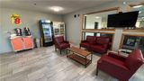 <b>Super 8 McLean/Bloomington SW Lobby</b>. Images powered by <a href="https://iceportal.shijigroup.com/" title="IcePortal" target="_blank">IcePortal</a>.