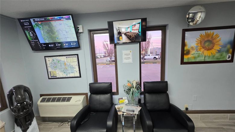 <b>Super 8 Emporia Lobby</b>. Images powered by <a href="https://iceportal.shijigroup.com/" title="IcePortal" target="_blank">IcePortal</a>.