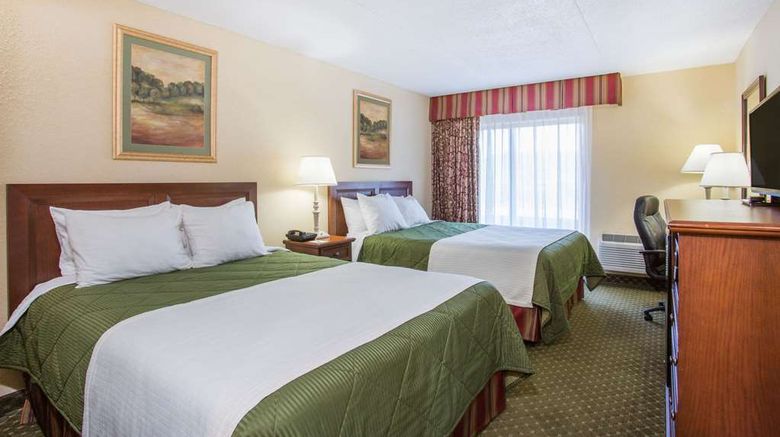 <b>Days Inn & Suites Sutton Flatwoods Room</b>. Images powered by <a href="https://iceportal.shijigroup.com/" title="IcePortal" target="_blank">IcePortal</a>.