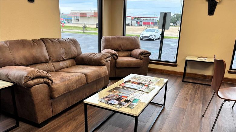 <b>Super 8 Booneville Lobby</b>. Images powered by <a href="https://iceportal.shijigroup.com/" title="IcePortal" target="_blank">IcePortal</a>.