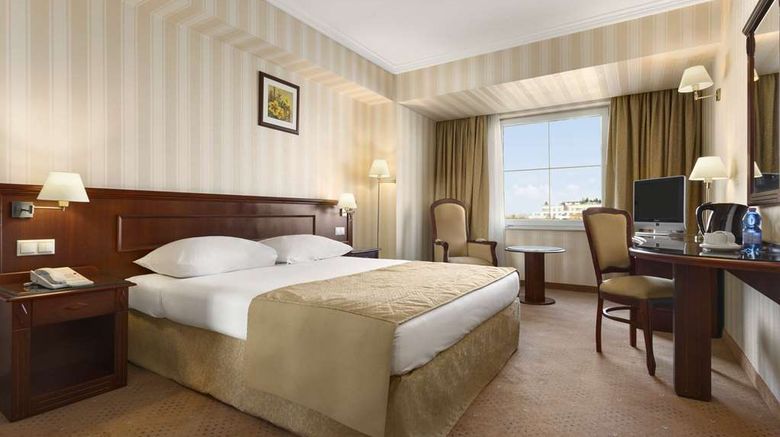 <b>Ramada Hotel & Suites Bucharest North Room</b>. Images powered by <a href="https://iceportal.shijigroup.com/" title="IcePortal" target="_blank">IcePortal</a>.