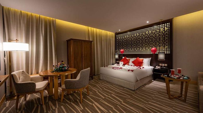 <b>Ramada Al Qassim Hotel and Suites Room</b>. Images powered by <a href="https://iceportal.shijigroup.com/" title="IcePortal" target="_blank">IcePortal</a>.