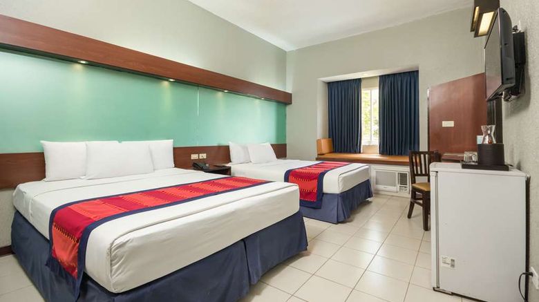 <b>Microtel by Wyndham Eagle Ridge Room</b>. Images powered by <a href="https://iceportal.shijigroup.com/" title="IcePortal" target="_blank">IcePortal</a>.