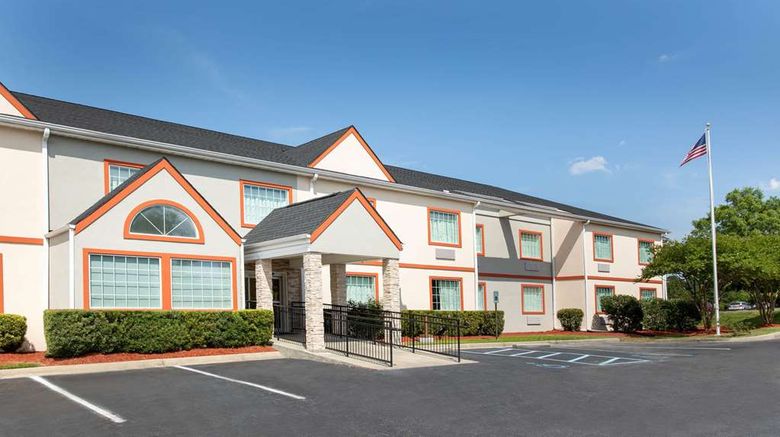 <b>Microtel Inn/Suites Two Notch Rd Exterior</b>. Images powered by <a href="https://iceportal.shijigroup.com/" title="IcePortal" target="_blank">IcePortal</a>.