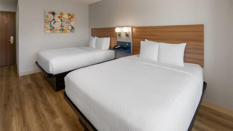 <b>Microtel Inn & Suites by Wyndham Denver Room</b>. Images powered by <a href="https://iceportal.shijigroup.com/" title="IcePortal" target="_blank">IcePortal</a>.