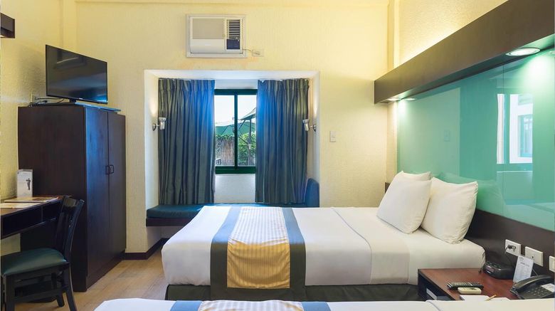 <b>Microtel Inn & Suites Cabanatuan Room</b>. Images powered by <a href="https://iceportal.shijigroup.com/" title="IcePortal" target="_blank">IcePortal</a>.