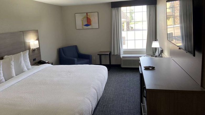 <b>Days Inn & Suites Tahlequah Room</b>. Images powered by <a href="https://iceportal.shijigroup.com/" title="IcePortal" target="_blank">IcePortal</a>.