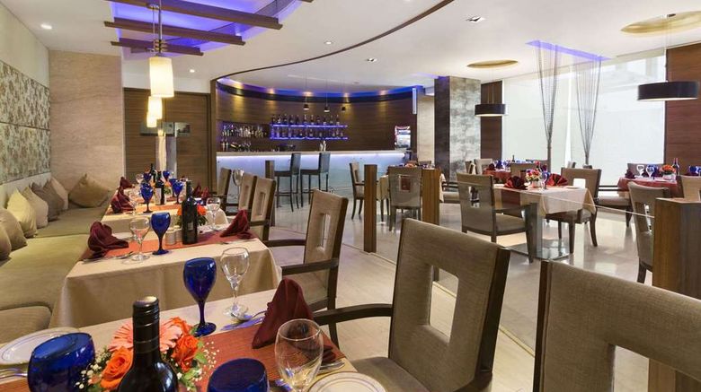<b>Ramada Navi Mumbai Restaurant</b>. Images powered by <a href="https://iceportal.shijigroup.com/" title="IcePortal" target="_blank">IcePortal</a>.