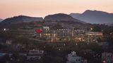 <b>Ramada by Wyndham Udaipur Resort & Spa Exterior</b>. Images powered by <a href=https://www.travelagewest.com/Hotels/Udaipur-India/