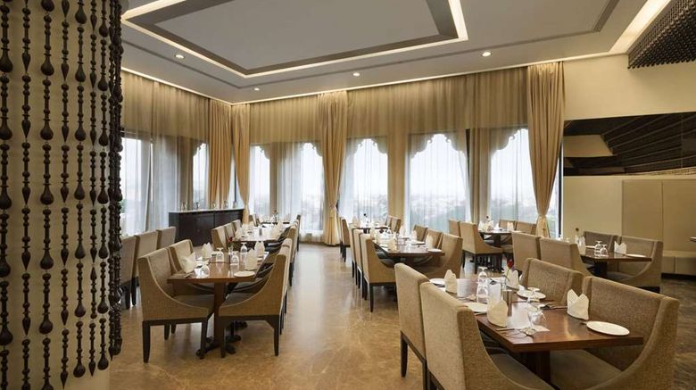<b>Ramada by Wyndham Udaipur Resort & Spa Restaurant</b>. Images powered by <a href=https://www.travelagewest.com/Hotels/Udaipur-India/