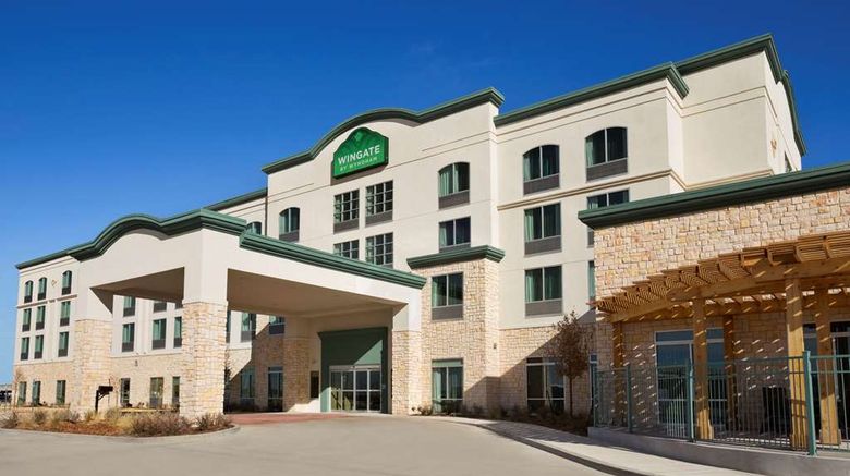 Wingate by Wyndham Seminole Exterior. Images powered by <a href="https://iceportal.shijigroup.com" target="_blank" rel="noopener">Ice Portal</a>.