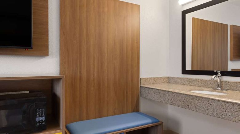<b>Days Inn & Suites Indianapolis Arpt East Room</b>. Images powered by <a href="https://iceportal.shijigroup.com/" title="IcePortal" target="_blank">IcePortal</a>.