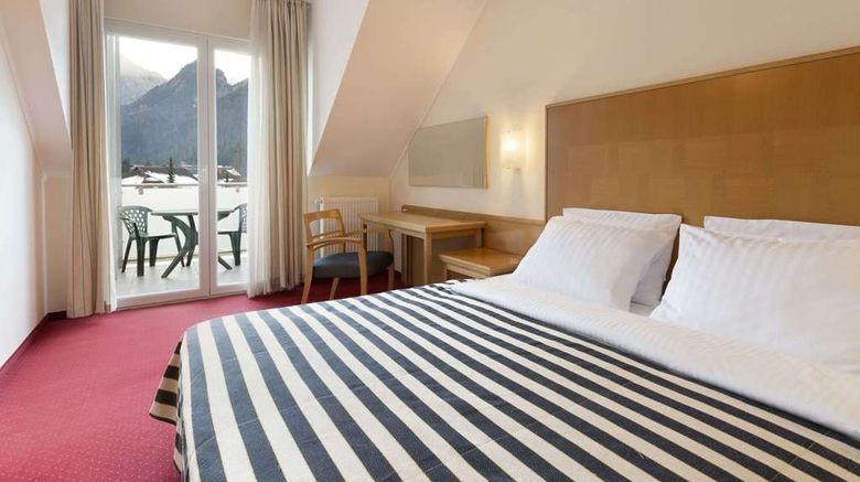 <b>Ramada Hotel & Suites Kranjska Gora Room</b>. Images powered by <a href="https://iceportal.shijigroup.com/" title="IcePortal" target="_blank">IcePortal</a>.