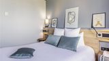 <b>Mercure Lyon Est Villefontaine Room</b>. Images powered by <a href="https://iceportal.shijigroup.com/" title="IcePortal" target="_blank">IcePortal</a>.