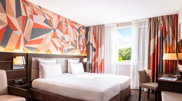 Mercure Omaha Beach Hotel Room