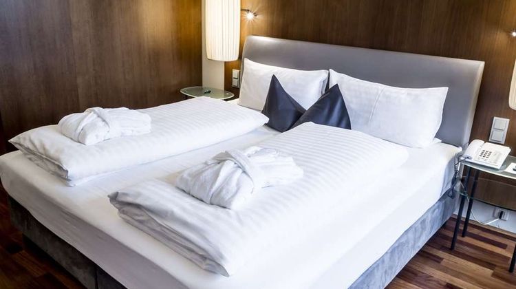 The Penz Hotel Room