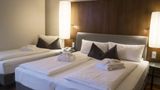 The Penz Hotel Room