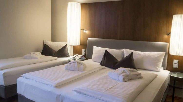 The Penz Hotel Room