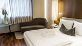 The Penz Hotel Room