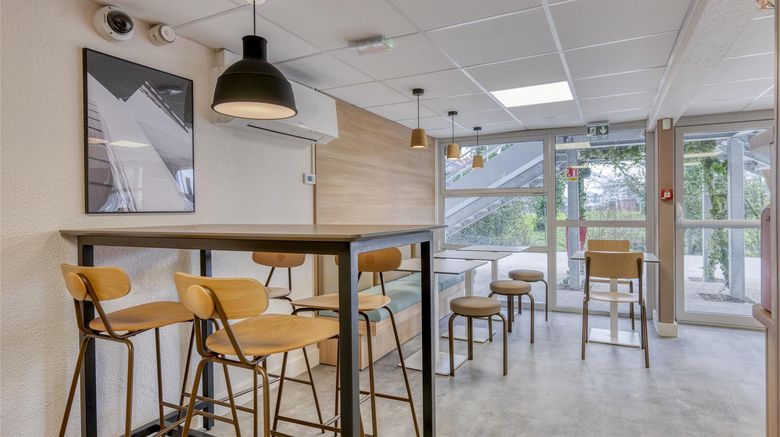 <b>Premiere Classe Lyon Est-Airport Exupery Restaurant</b>. Images powered by <a href="https://iceportal.shijigroup.com/" title="IcePortal" target="_blank">IcePortal</a>.