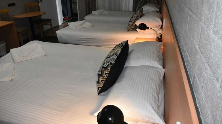 Coachman's Inn Motel Room