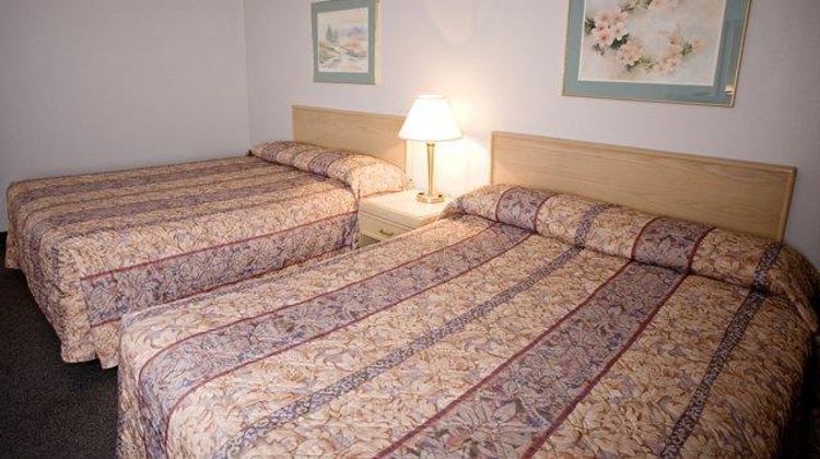Heritage Inn & Suites Room