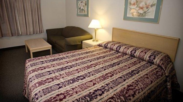 Heritage Inn & Suites Room